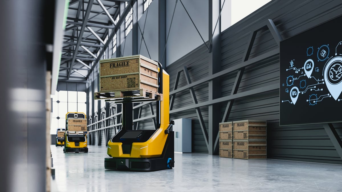 Smart logistics autonomous forklift robot carrying cargo crate with digital tracking screen in modern warehouse